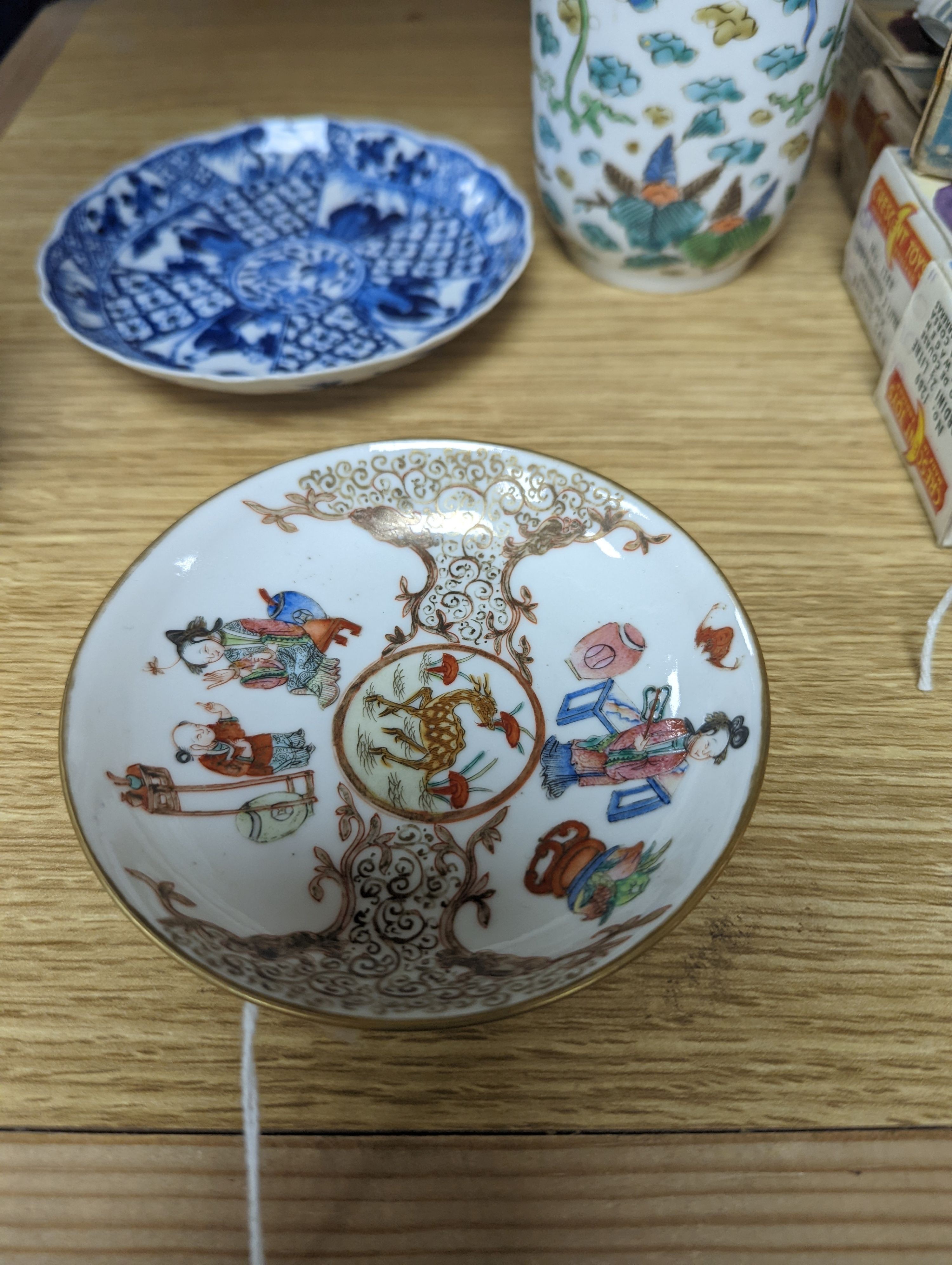Two Chinese porcelain saucer dishes and an enamelled porcelain vase, 18th century and later, 12.5cm